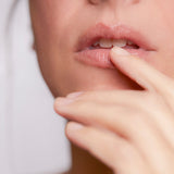 Close-up of model's lips with natural sheen