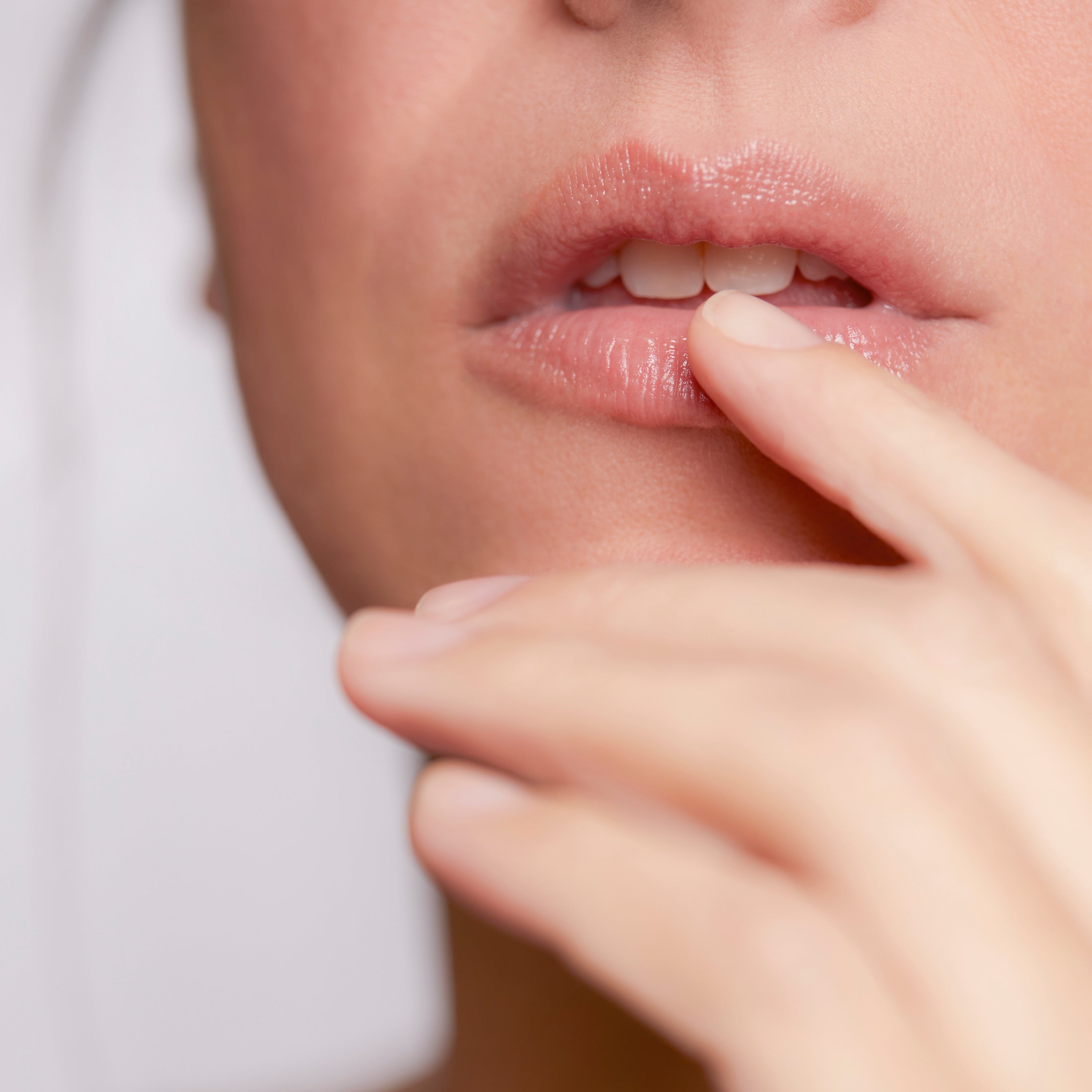 Close-up of model's lips with natural sheen