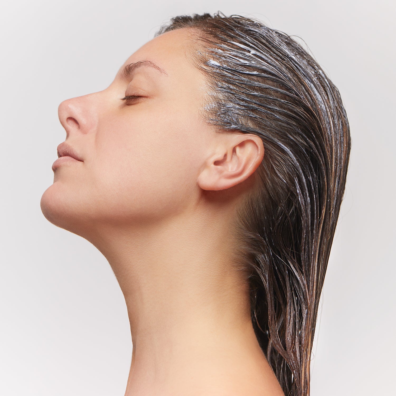 Model with Conditioner in hair