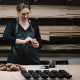 Women designing Mirrored Mask Stand